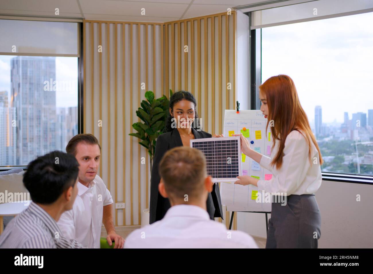 Vendor is meeting for solar panel. Environment and clean energy concept. Stock Photo