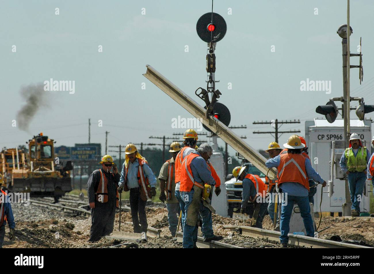 Railroad workers lay new track Stock Photo Alamy