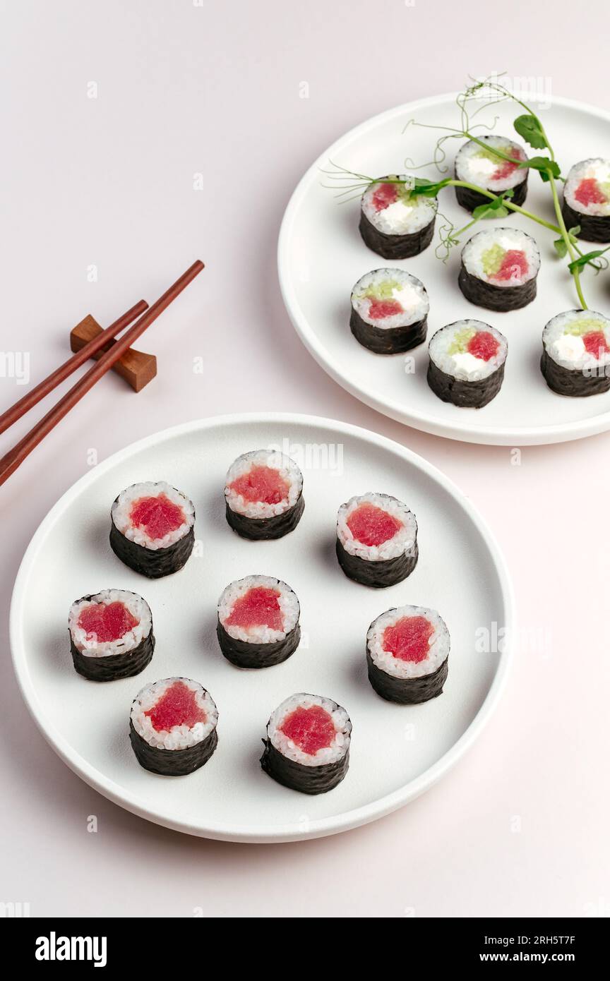 Classic Japanese sushi rolls with salmon Stock Photo - Alamy
