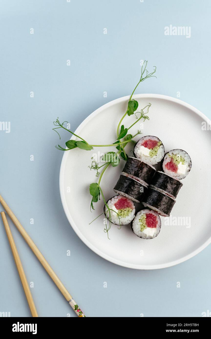 Classic Japanese sushi rolls with salmon Stock Photo - Alamy