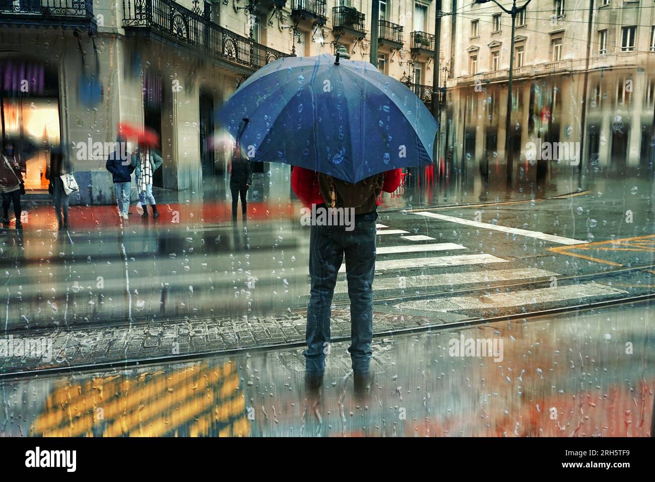 Pedestrian with umbrella hi-res stock photography and images - Alamy