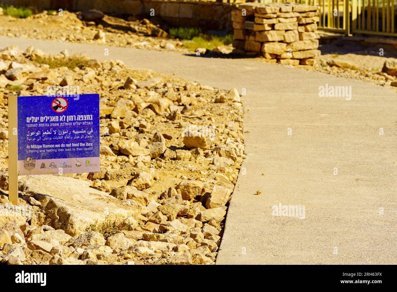 Mitzbe Ramon Mitzpe Ramon, Israel - August 11, 2023: Trilingual sign calling not to ...
