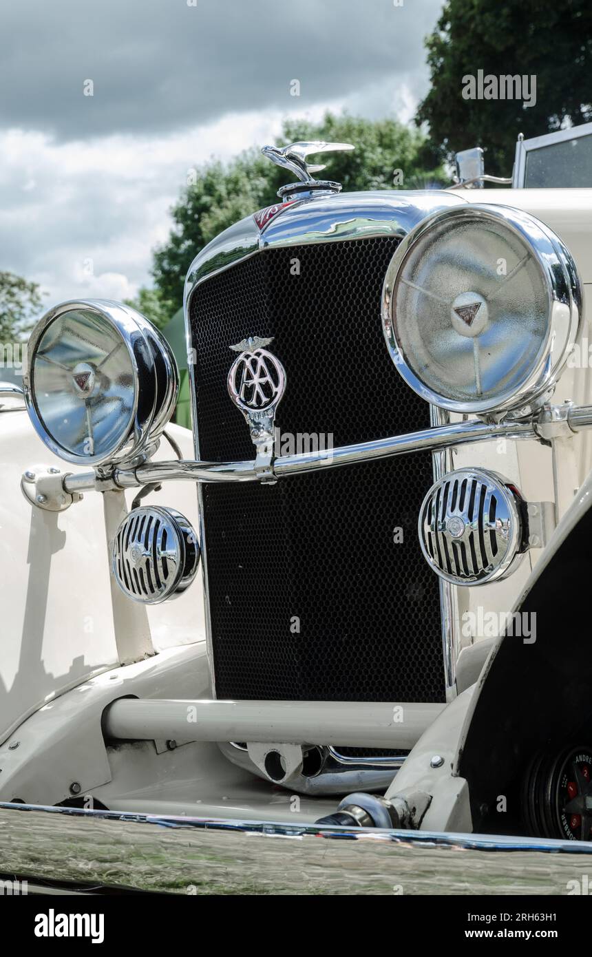 Front end view of an 1930s Alvis Speed 20 showing headlights, Radiator and eagle bonnet badge Stock Photo