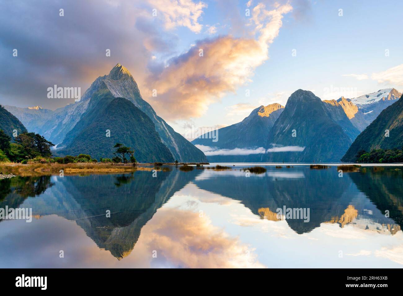 Milford Sound, one of New Zealand's most famous landscapes, at sunrise. Stock Photo