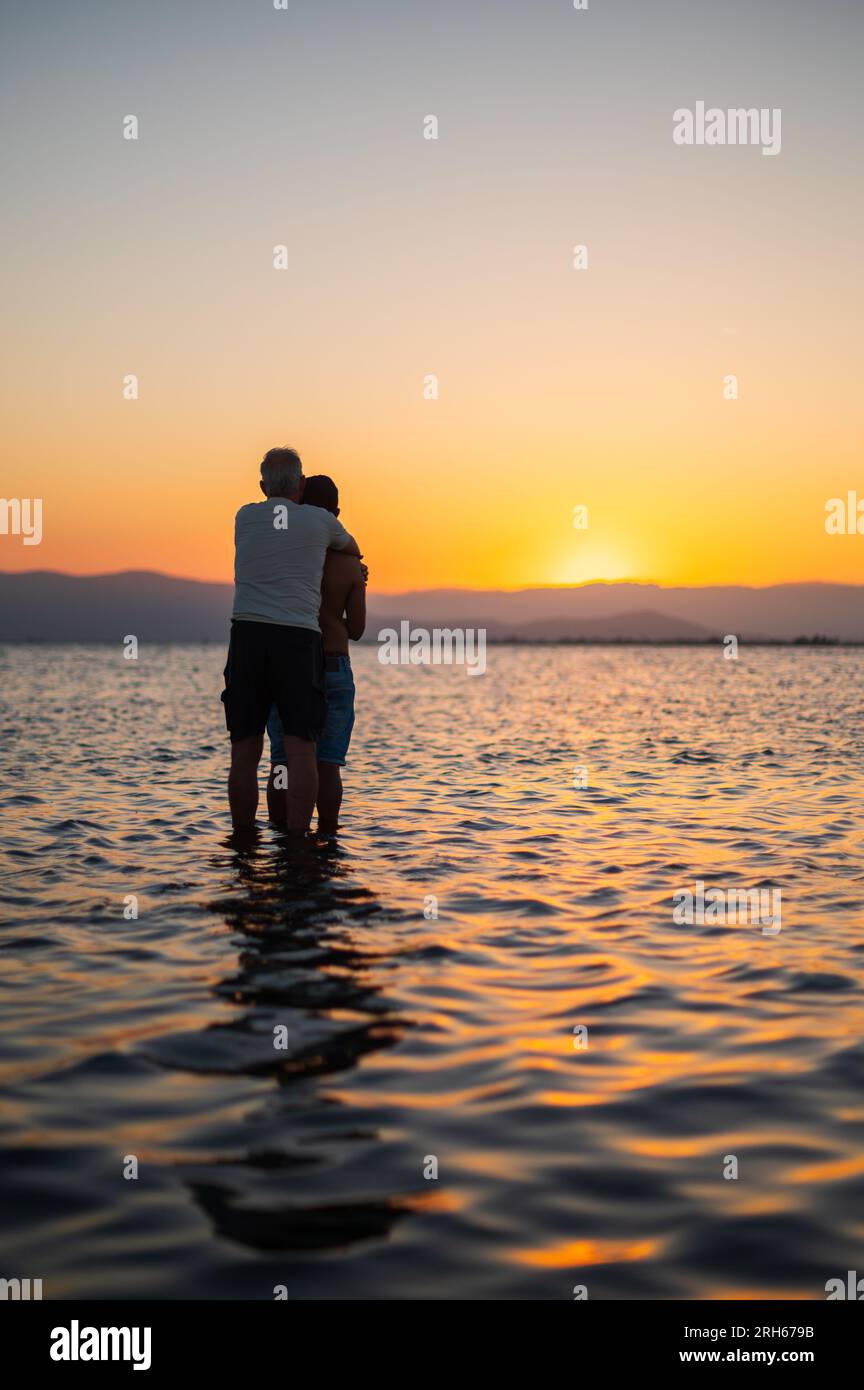 Gay couple at beach hires stock photography and images Alamy