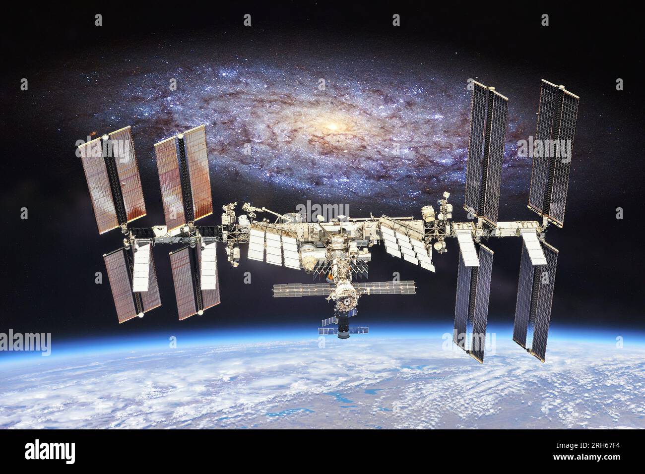 ISS with stars and galaxies. Elements of this image furnished by NASA. Stock Photo