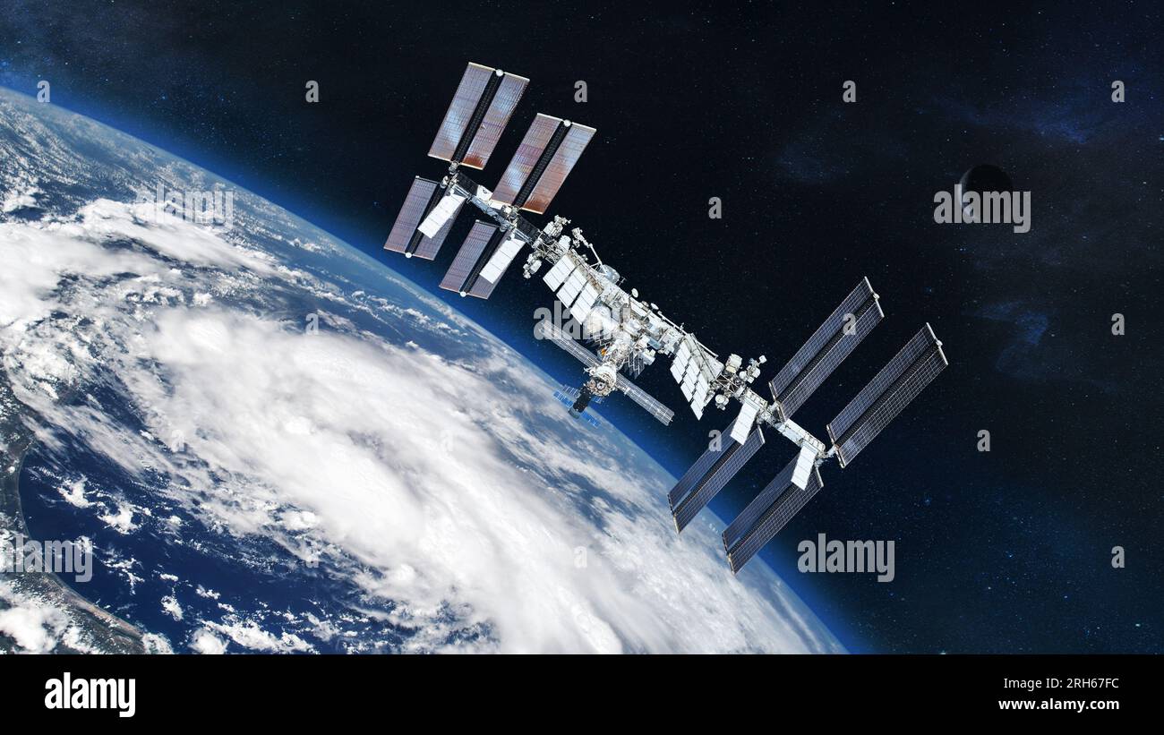 ISS with solar panel discovery Earth atmosphere. Element of this image furnished by NASA. Stock Photo