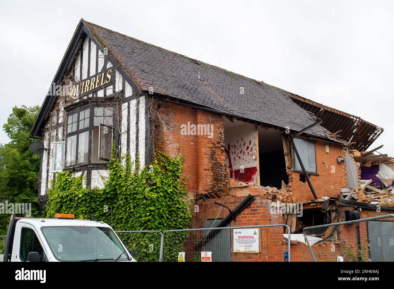 Winkfield, UK. 14th August, 2023. Locals are sad to see the Squirrels pub and restaurant in Winkfield, Berkshire being demolished today especially as the building is listed as a listed as an Asset of Community Value, however, some are glad to see it go due to anti social behaviour at the site and an infestation of rats. Planning permission has been given to build three new five bedroom houses on the site. Credit: Maureen McLean/Alamy Live News Stock Photo