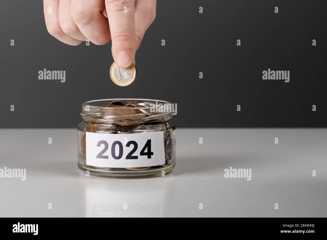 Budget 2024 Banner Businessman Hand Puts Coin In Change Jar Financial   Budget 2024 Banner Businessman Hand Puts Coin In Change Jar Financial Calculate And Planning Clever Yearly Plan For Money Saving Business Manageme 2RH69XJ 