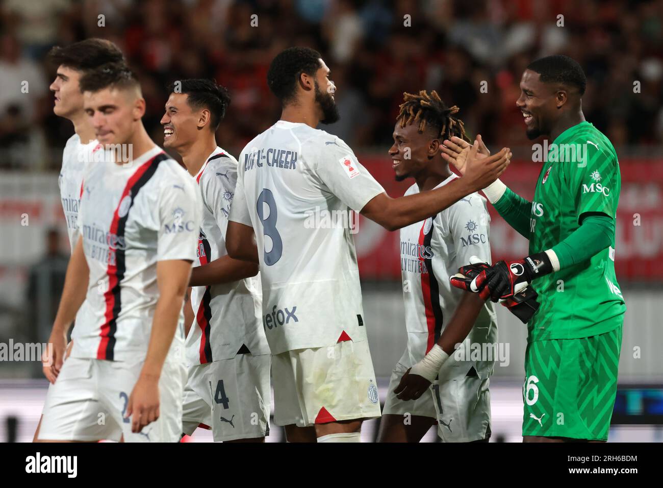 Monza, Italy, 8th August 2023. Team mates congratulate with Mike Maignan of AC Milan following the penalty shoot out victory in the Trofeo Silvio Berlusconi match at U-Power Stadium, Monza. Picture credit should read: Jonathan Moscrop / Sportimage Stock Photo