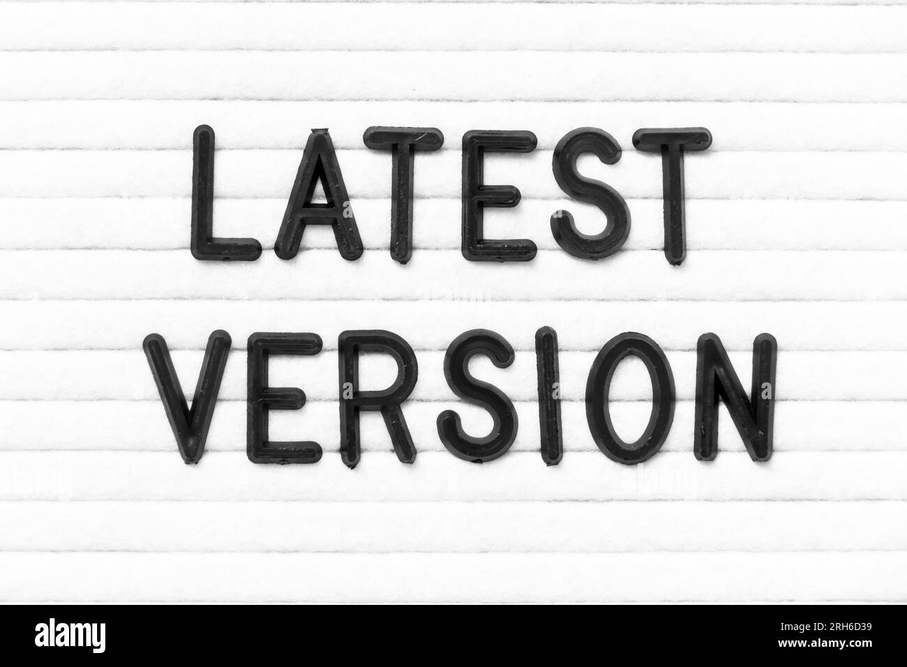 Black color letter in word latest version on white felt board