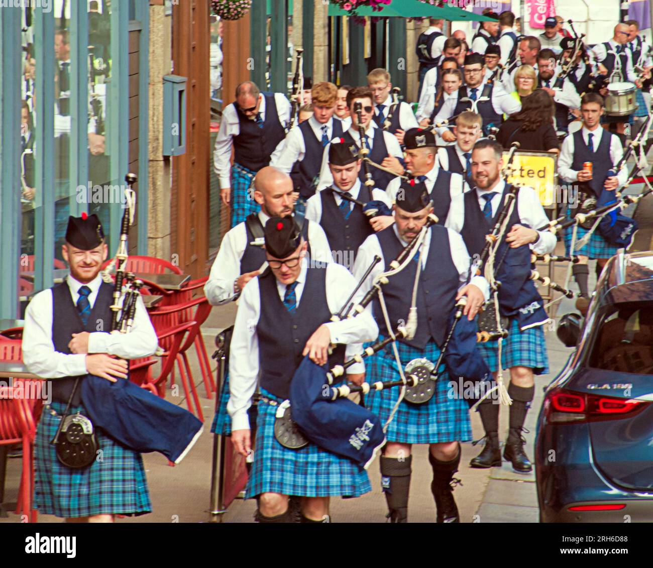 Glasgow, Scotland, UK. 14th  August, 2023.   Piping live hit the city as hundreds of pipe bad musicians swarmed the city centre with the bands streaming down from the piping centre.  Credit Gerard Ferry/Alamy Live News Stock Photo