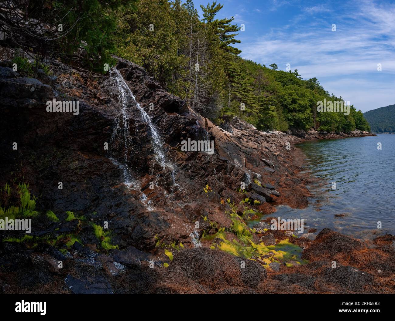 Scenic landscape with a waterfall Stock Photo - Alamy