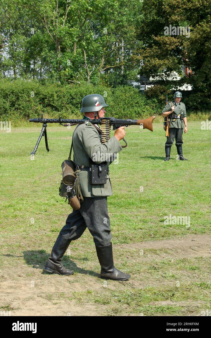 Re-enactor of Second World War German army soldier. Wehrmacht infantryman with Maschinengewehr 34, or machine gun 34, MG 34 and equipment Stock Photo