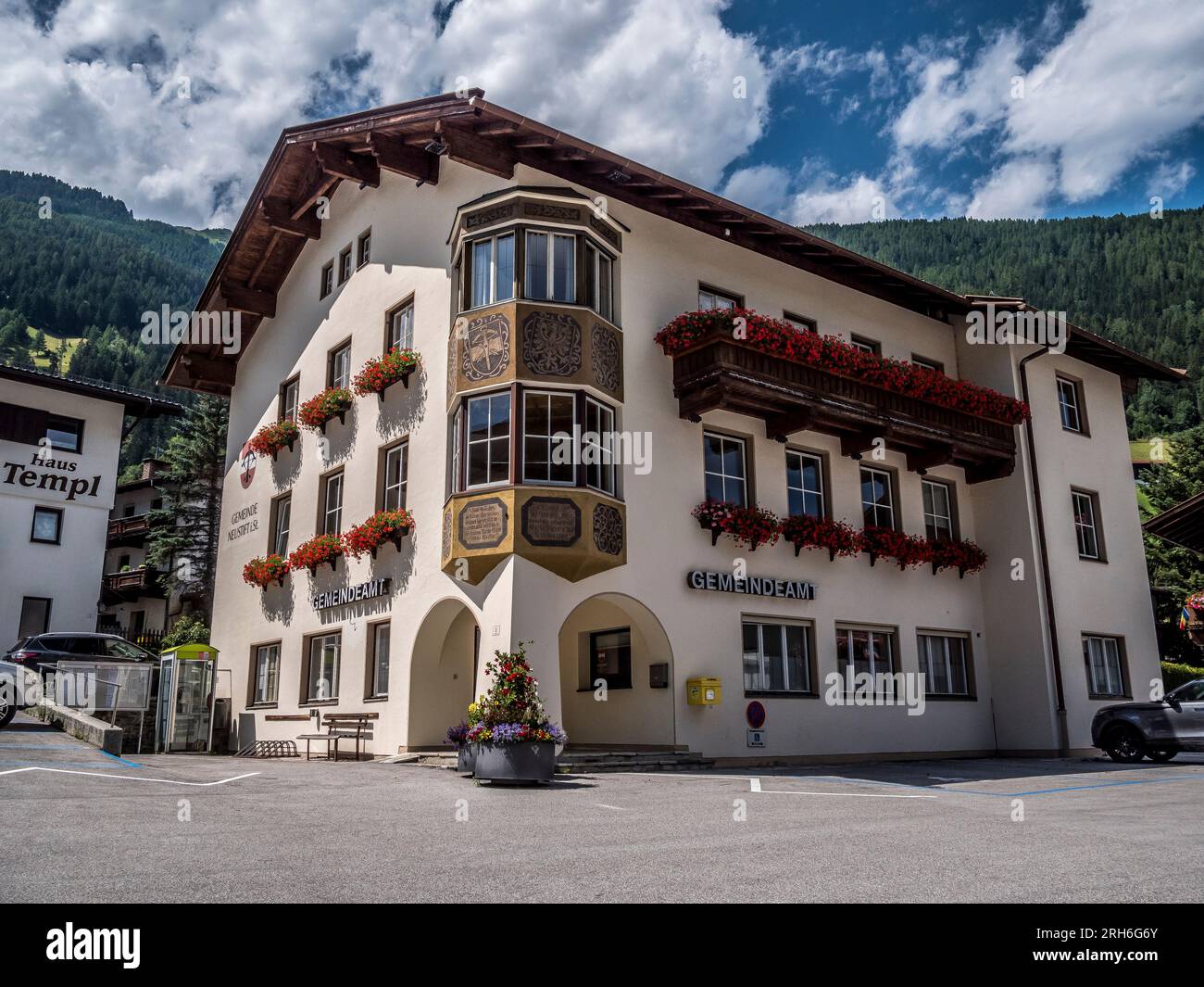 The image is of the Rathaus, Town Hall in Neustift, the principle village and tourist centre in the Stubaital valley of the Austrian Tirol Stock Photo