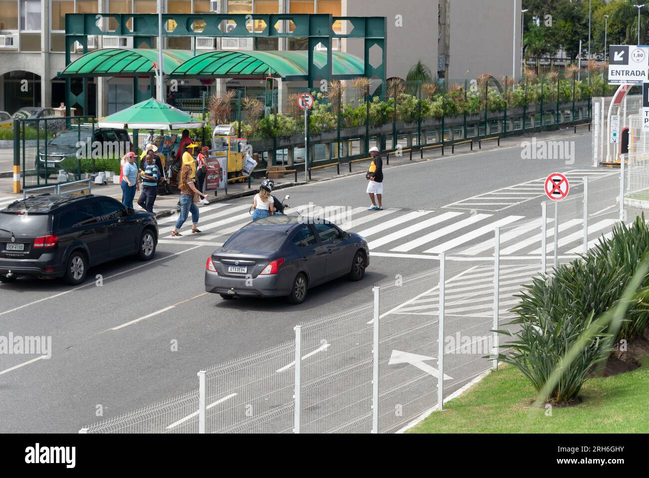 Cars on street crossing in big city with pedestrian crossing hi-res ...