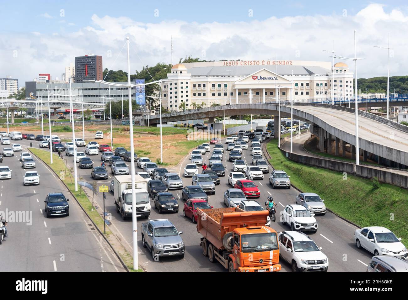 Salvador, Bahia, Brazil - August 11, 2023: Traffic movement of cars, buses and motorcycles near the Raul Seixas viaduct on Avenida Tancredo Neves in S Stock Photo
