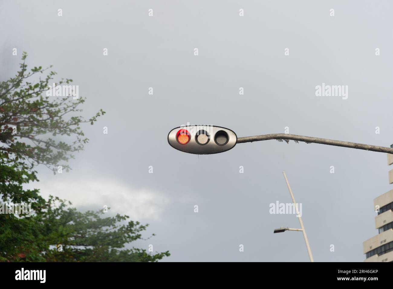 Salvador, Bahia, Brazil August 14, 2023; Traffic light at the top on a rainy day indicating