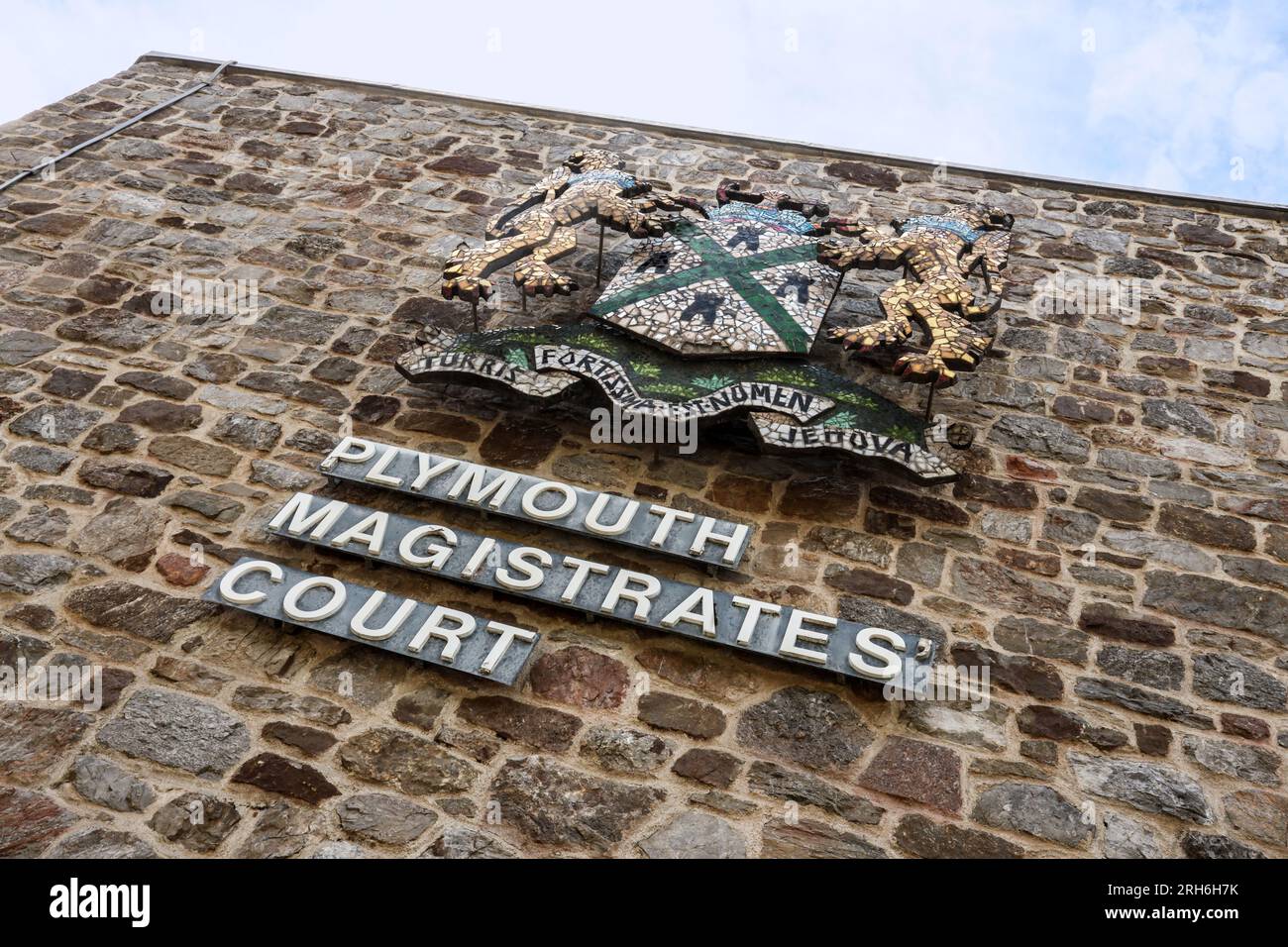 The sign on Plymouth Magistrates Court in St Andrew’s Street, including a mosaic city crest. Stock Photo