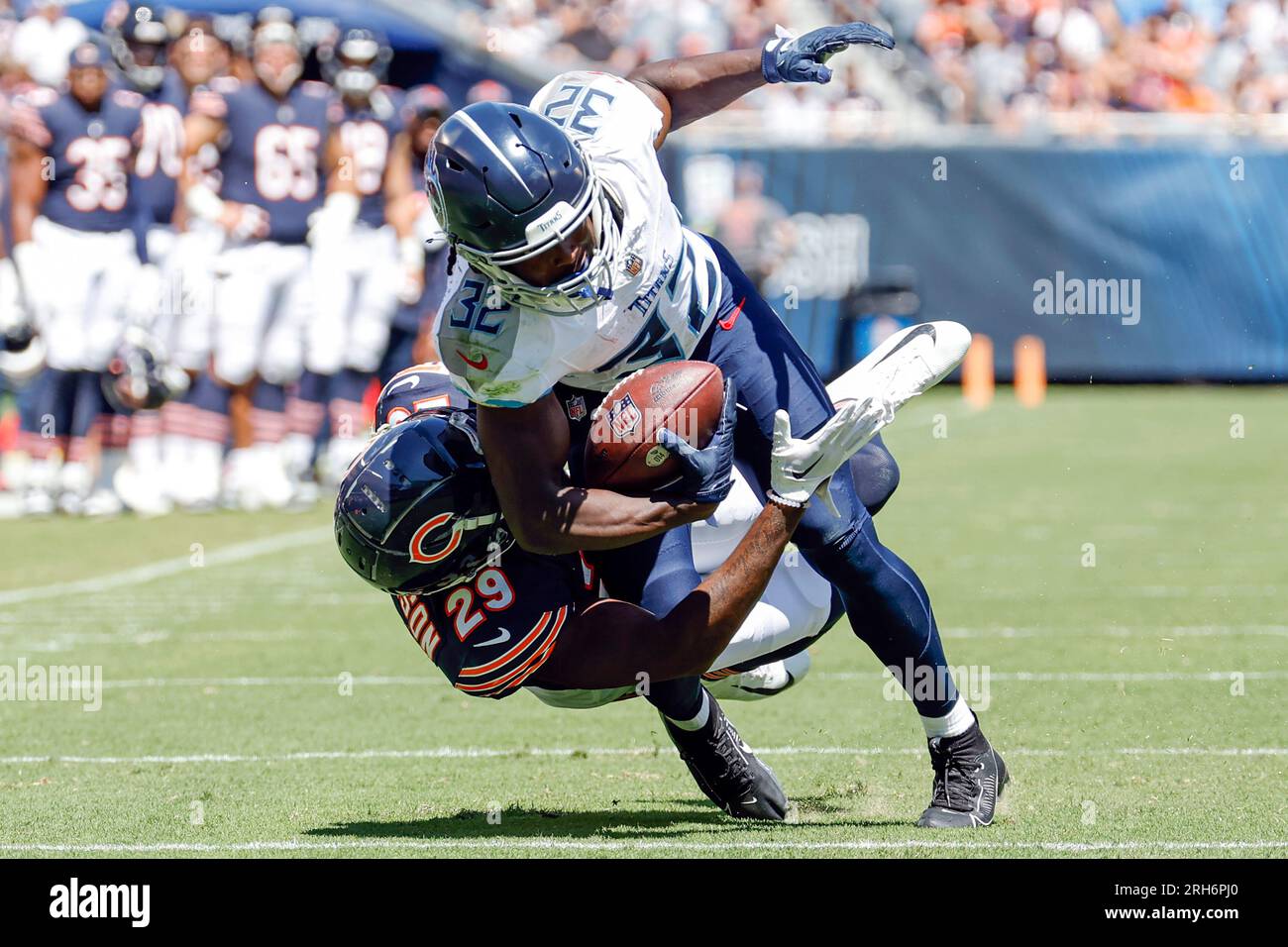 Tennessee Titans running back Tyjae Spears, right, runs the ball as  Jonathan Ward (33) defends during an NFL football training camp practice  Saturday, July 29, 2023, in Nashville, Tenn. (AP Photo/Mark Zaleski