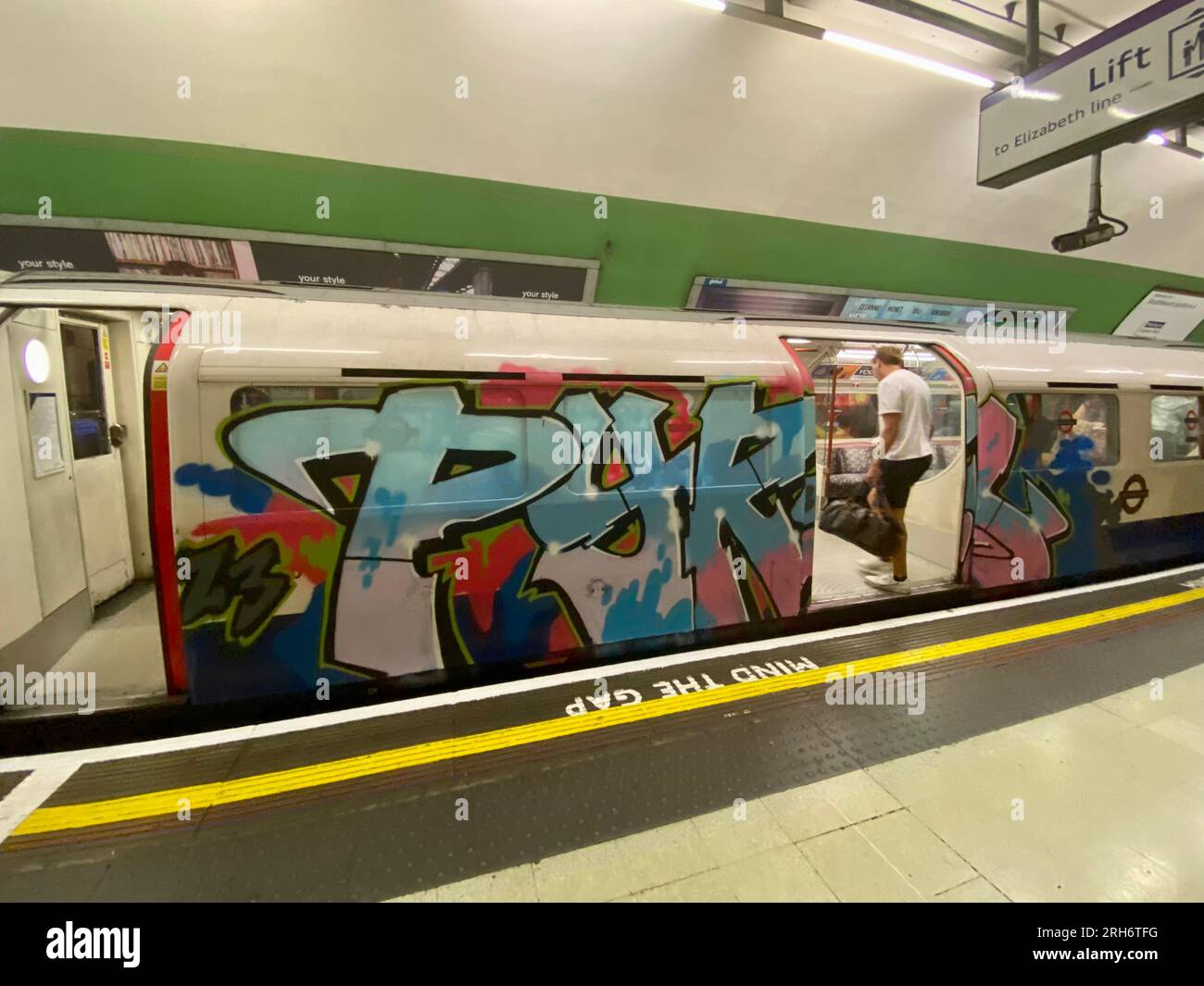 a graffiti painted underground train in a station on the london underground london england uk 2023 Stock Photo