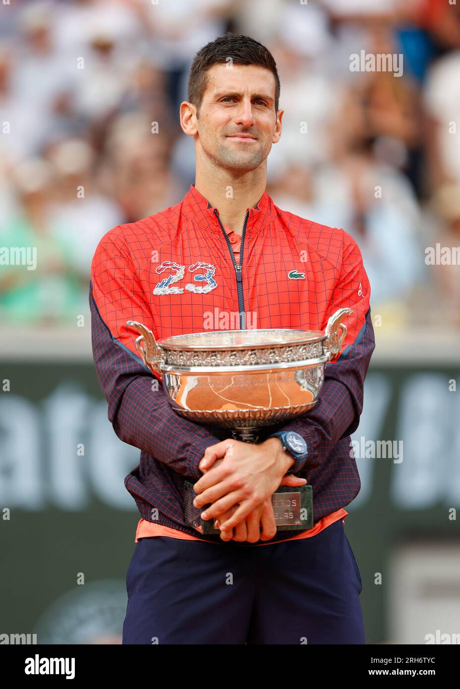Serbian tennis player Novak Djokovic holding  the championship trophy is now the record holder with 23 Grand Slams after winning the men's singles fin Stock Photo