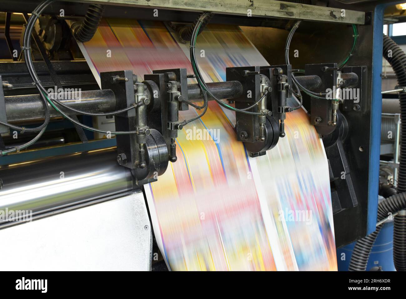 printing of coloured newspapers with an offset printing machine at a printing press company Stock Photo