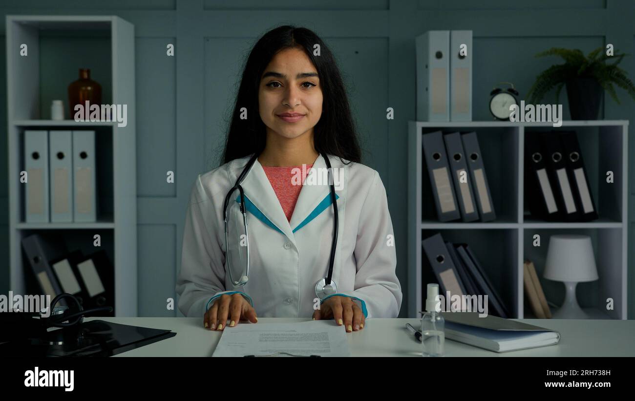 Indian female doctor treating young hi-res stock photography and images ...