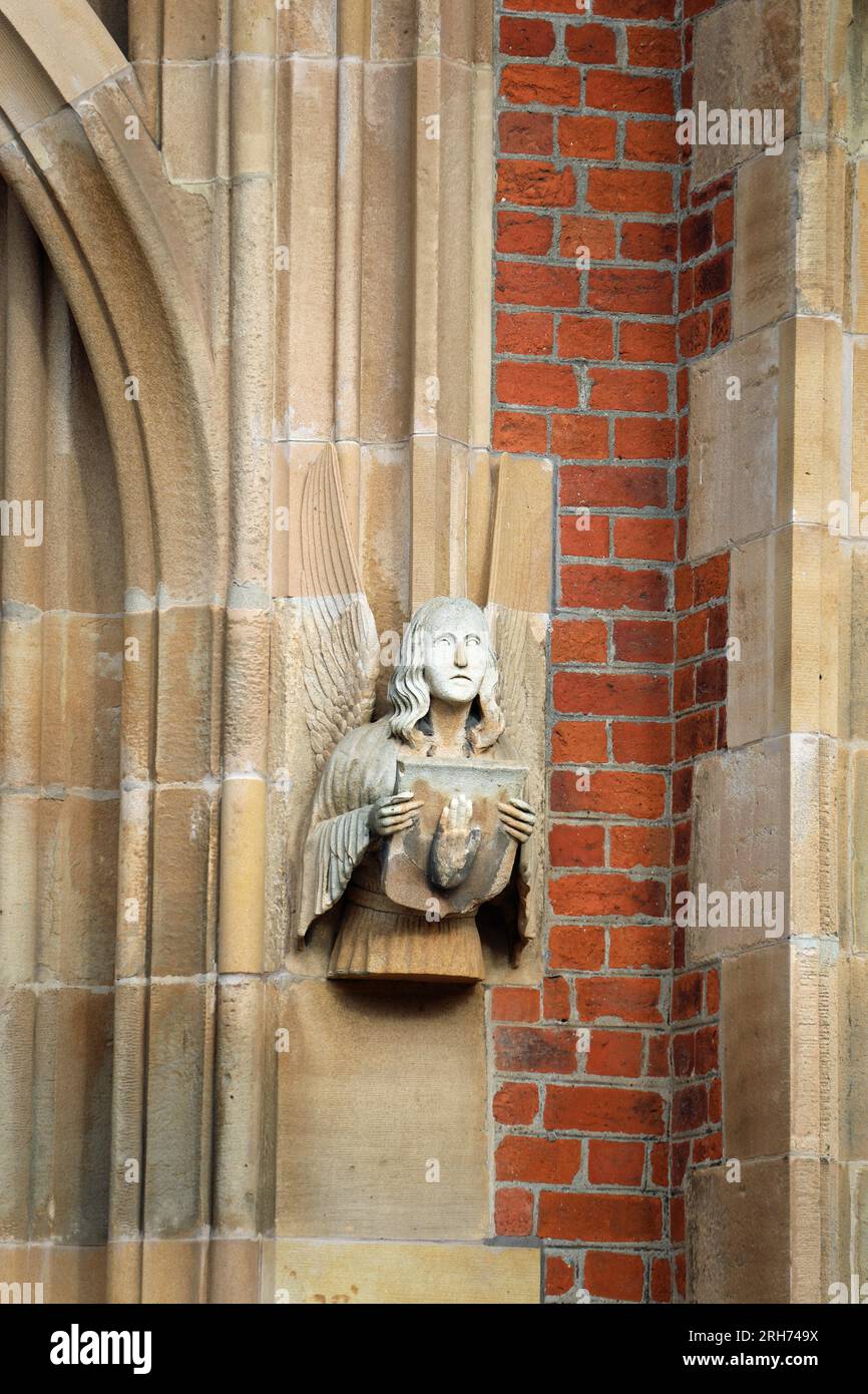 Angel holding the Hand of Ulster at the entrance to Queens University in Belfast Stock Photo