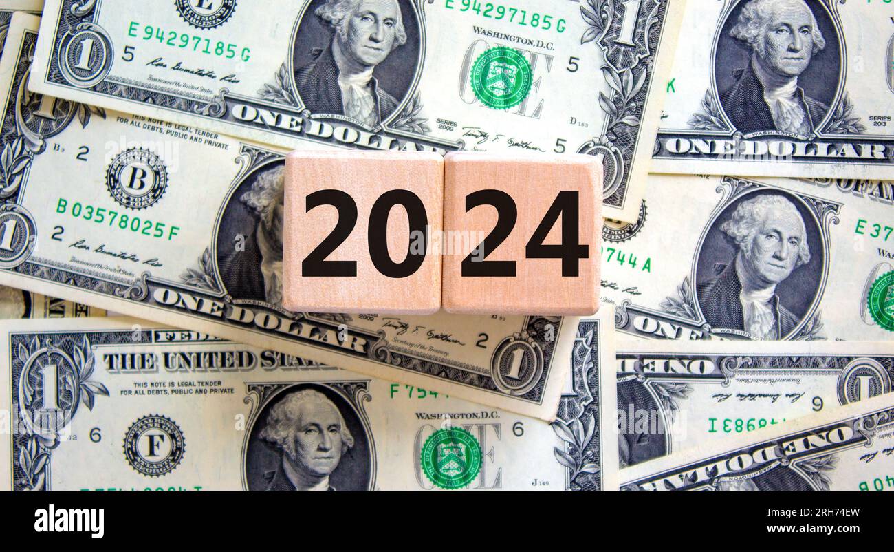2024 happy new year symbol. Wooden cubes with number 2024. Dollar bills