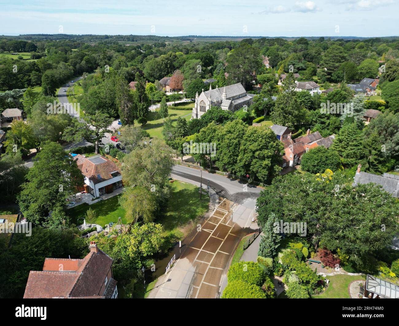Road ford Brockenhurst Village in New Forest Hampshire UK aerial view