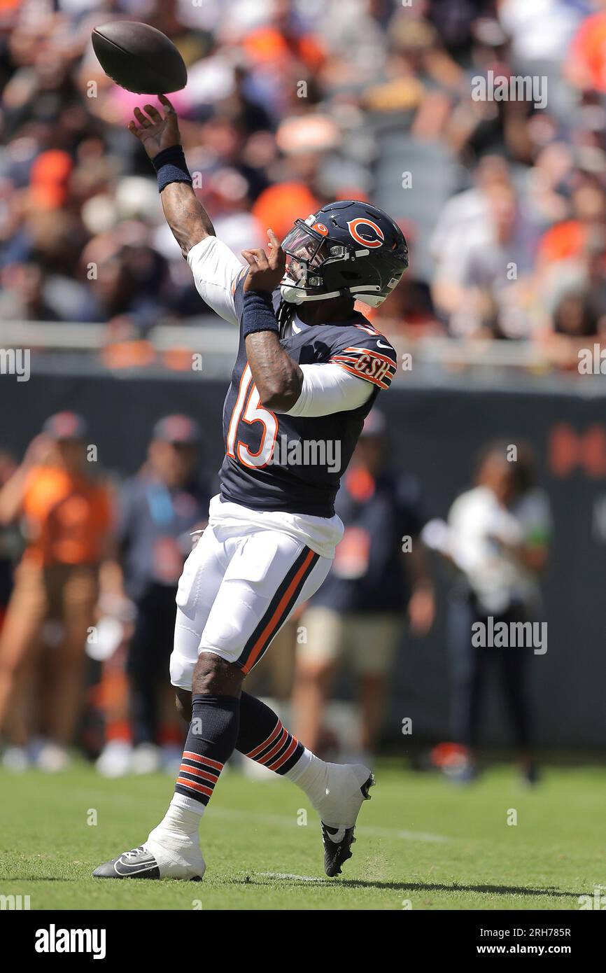 Chicago Bears quarterback PJ Walker (15) throws the ball during the first  half of an NFL football game against the Tennessee Titans, Saturday, Aug.  12, 2023, in Chicago. (AP Photo/Melissa Tamez Stock