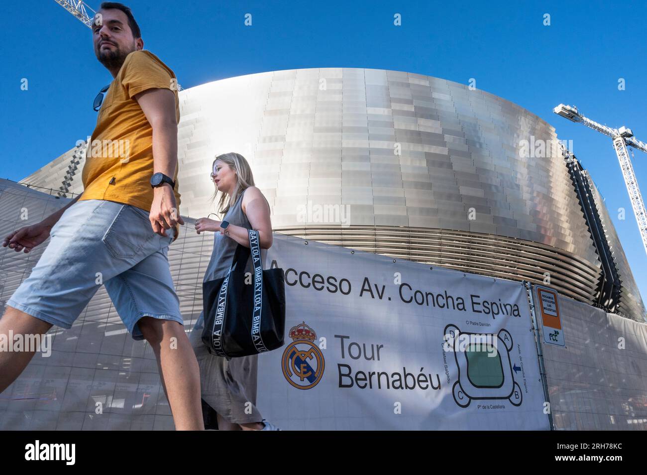 Madrid, Spain. 14th Aug, 2023. People are seen outside Real Madrid´s football stadium, Santiago Bernabeu, as it goes through the last stage of completing its new design and full renovation. The entire project has a reported cost of nearly €1 billion and is expected to be completed by the end of 2023. Credit: SOPA Images Limited/Alamy Live News Stock Photo