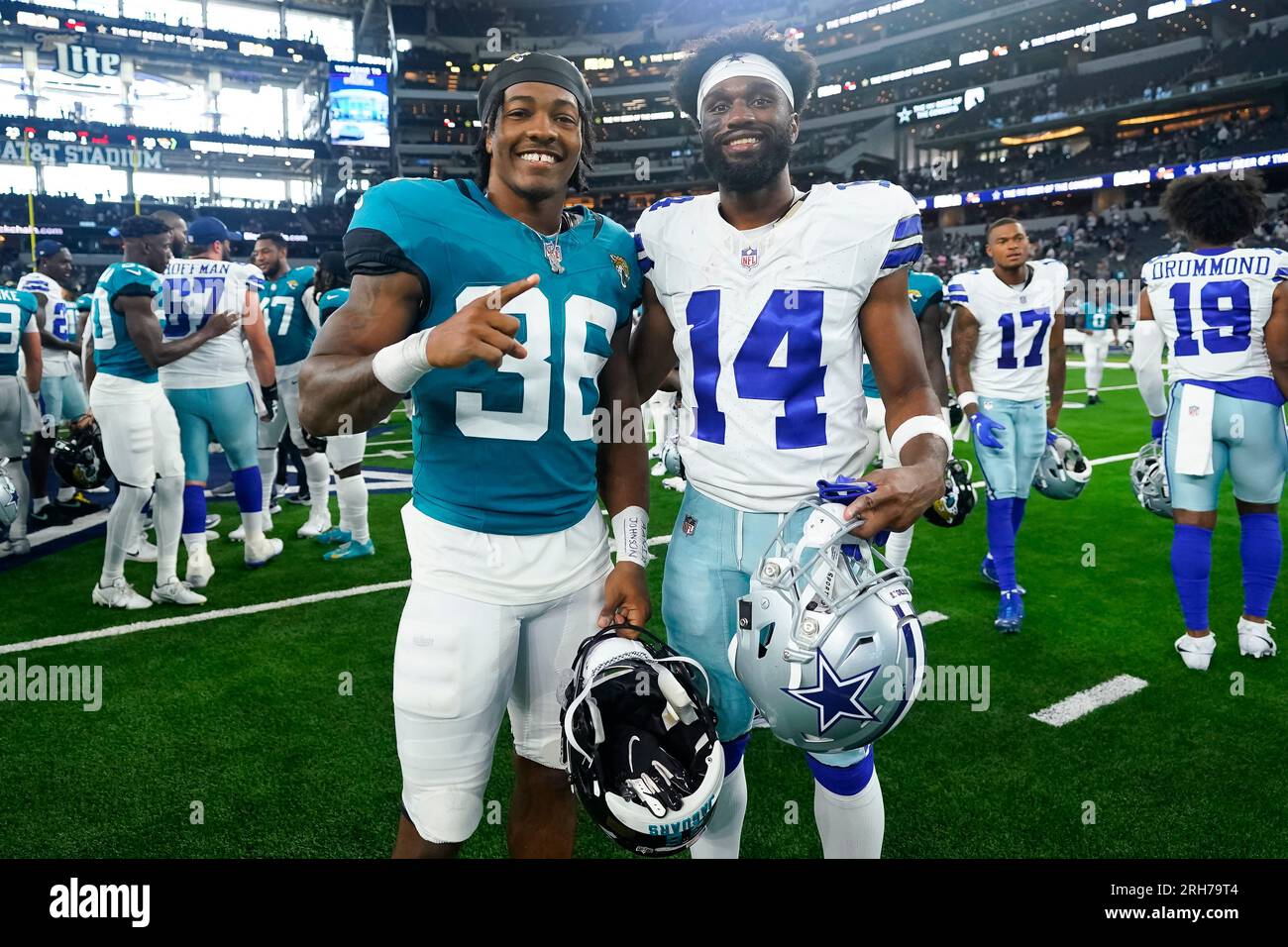 Jacksonville Jaguars cornerback Christian Braswell (36) and Dallas Cowboys  wide receiver Jose Barbon (14) pose for