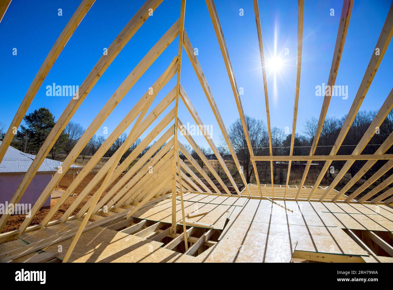 Support beams beams roof construction at new house construction using