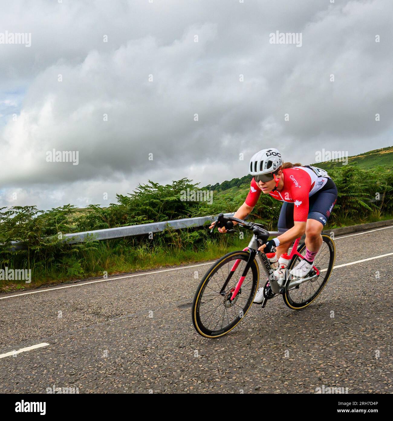 Glasgow, Scotland. 13th Aug, 2023. A Canadian competitor descending the Crow Road during the UCI Womens Elite Cycling Road Race in Glasgow, Scotland. Stock Photo