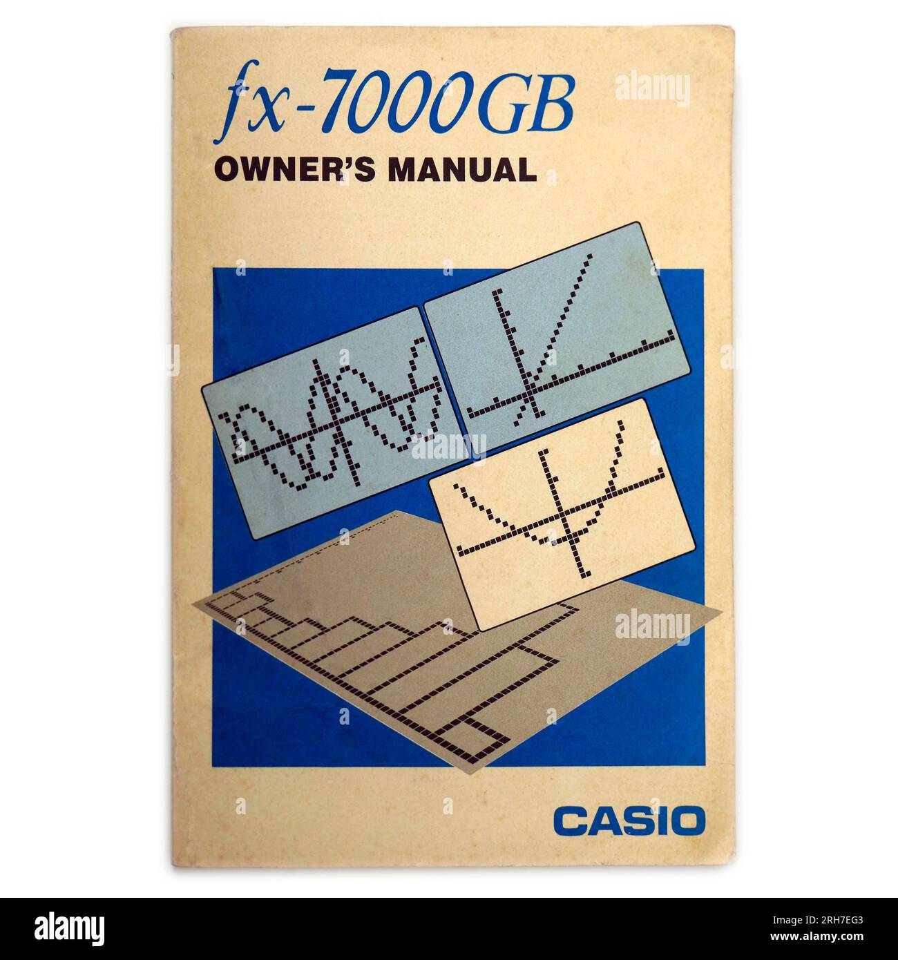 Casio fx - 7000GB Owner's Manual paperback book cover. Studio set up with white background Stock Photo