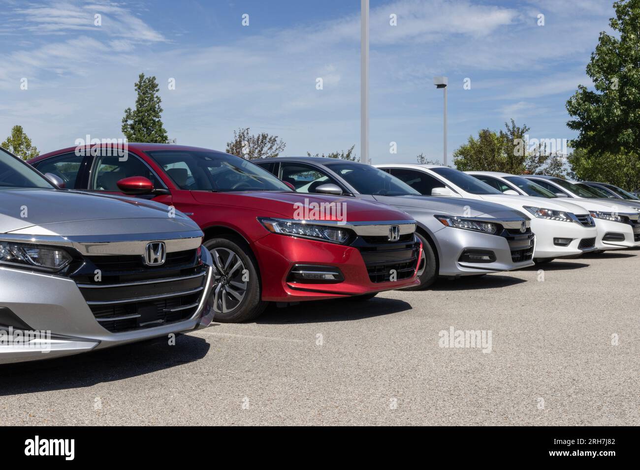 Fishers - August 13, 2023: Honda Accord display at a dealership. Honda offers the Accord in EX and LX or Hybrid models. Stock Photo