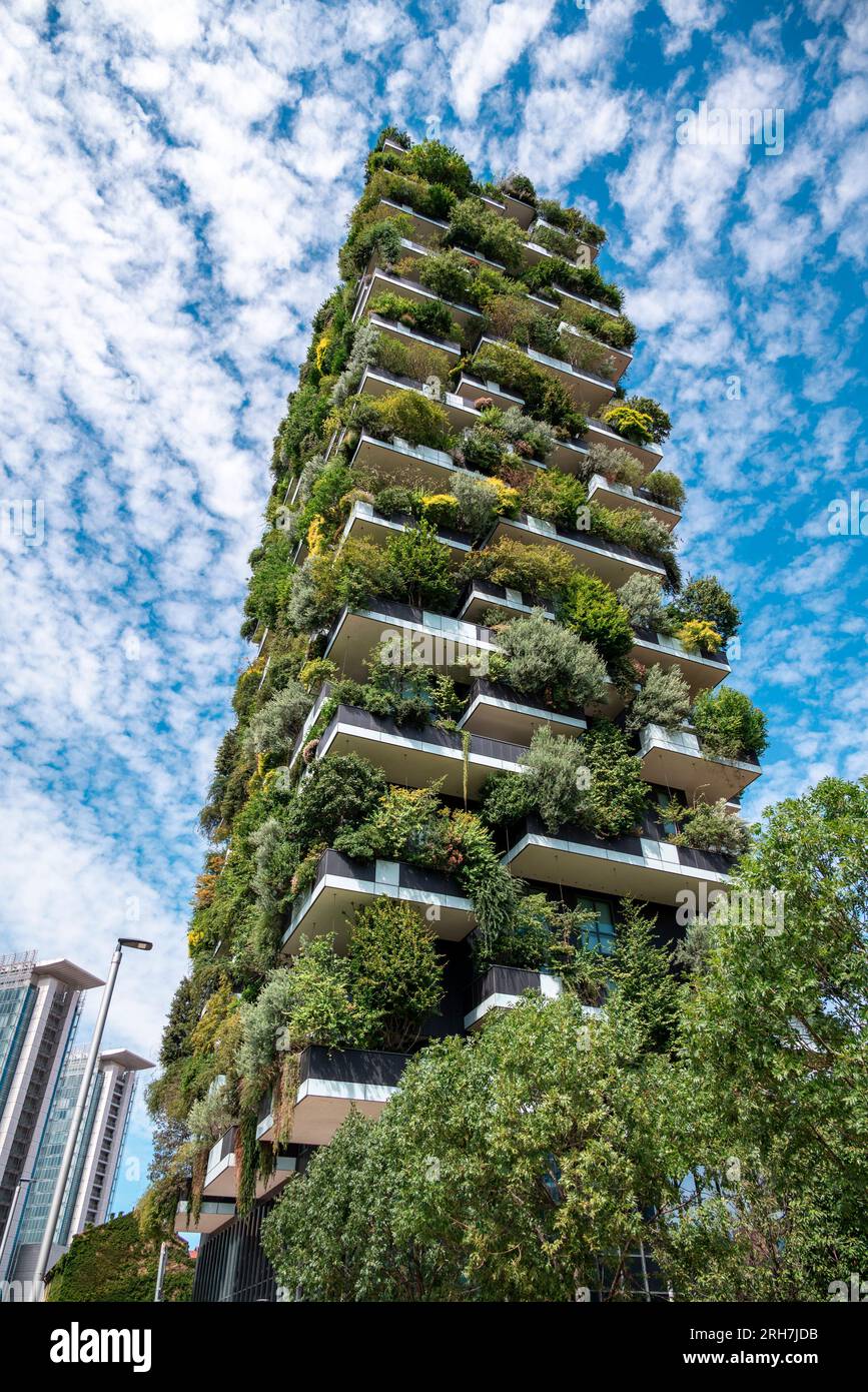 View of the balconies and terraces of Bosco Verticale, full of green plants. Spring time. 0808-2023. Milan, Porta Nuova skyscraper residences, Italy. Stock Photo