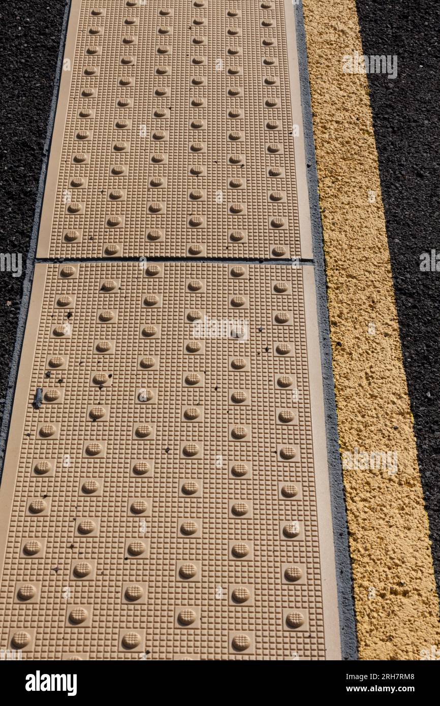 Tactile edging on a railway station platform at Kents Bank (Cumbria