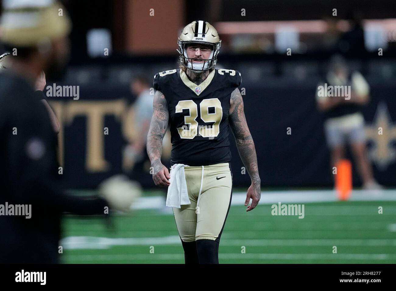 New Orleans Saints punter Lou Hedley (39) warms up before an NFL
