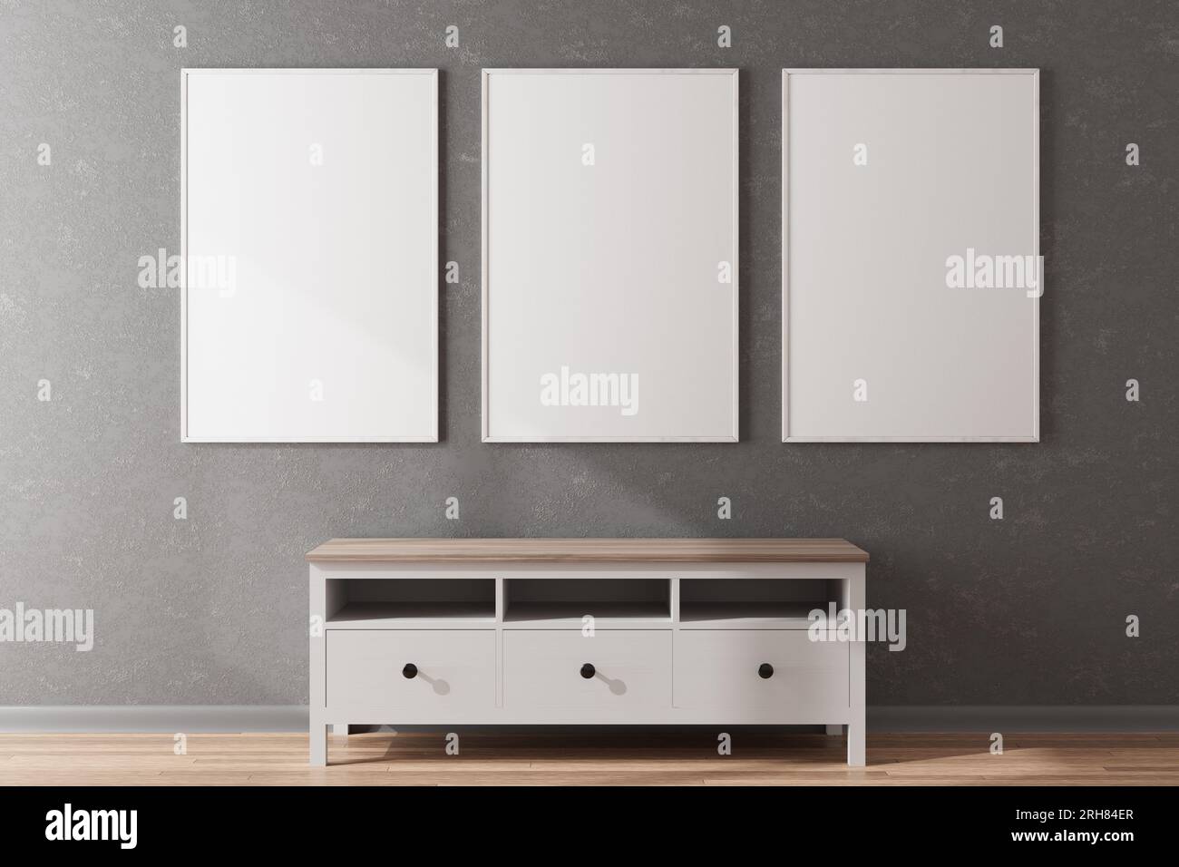Mockup paintings, posters, photographs. Three empty wooden frames for a photo or picture on a white wall in a room with furniture. Design template for Stock Photo
