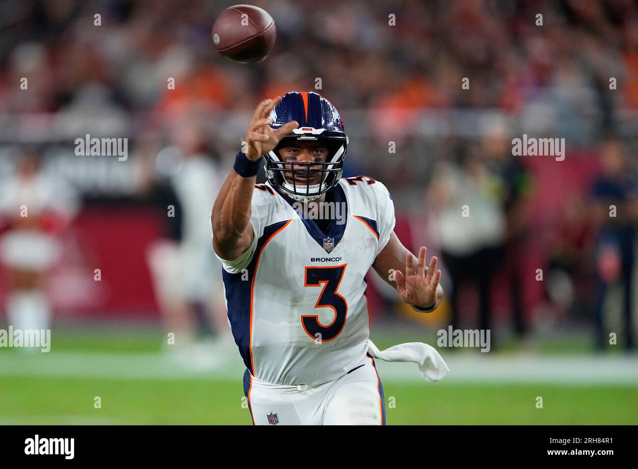 Denver Broncos quarterback Russell Wilson (3) looks to pass against the ...