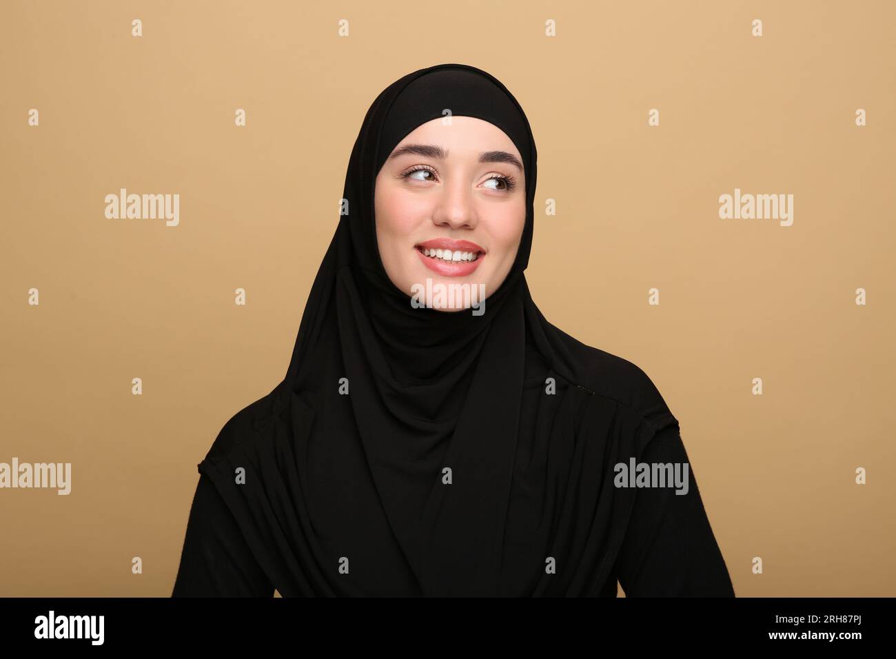 Young muslim woman in wear black dress hi-res stock photography and ...