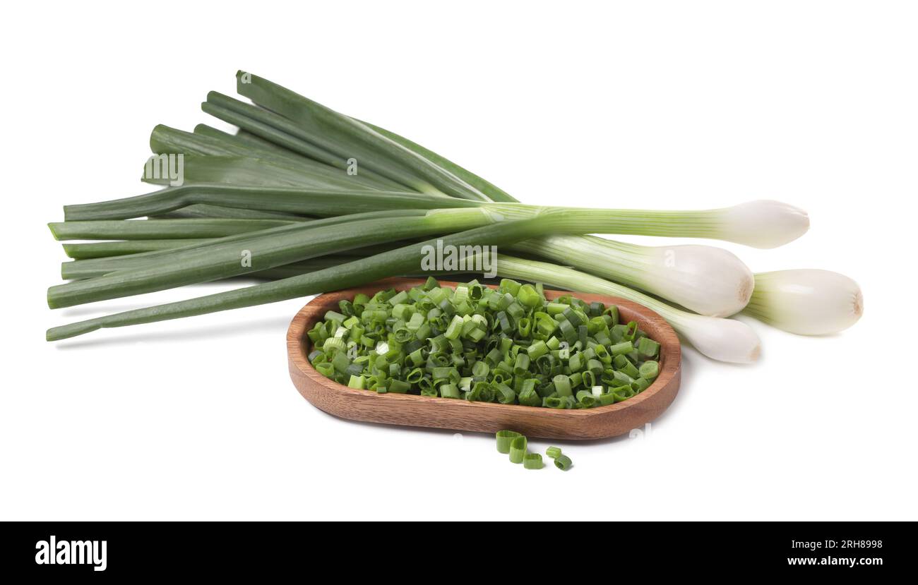 Whole and chopped green onion isolated on white Stock Photo - Alamy