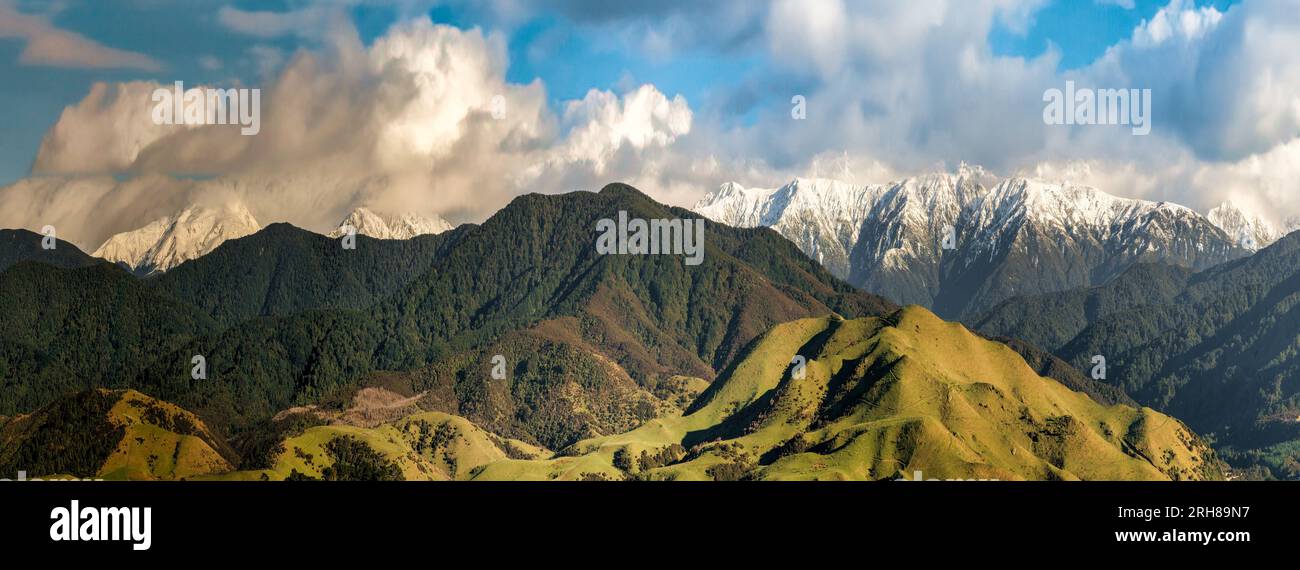 The snow covered peaks of the Tararua Ranges photographed from the highest peaks of the inland hills near Mt Bruce, Masterton NZ Stock Photo