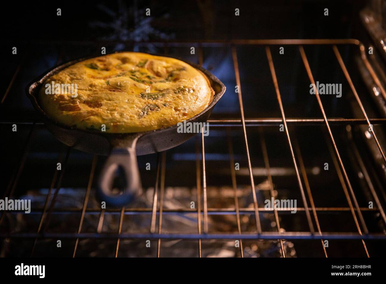 Cast Iron Skillet Frittata in the Oven Stock Photo Alamy