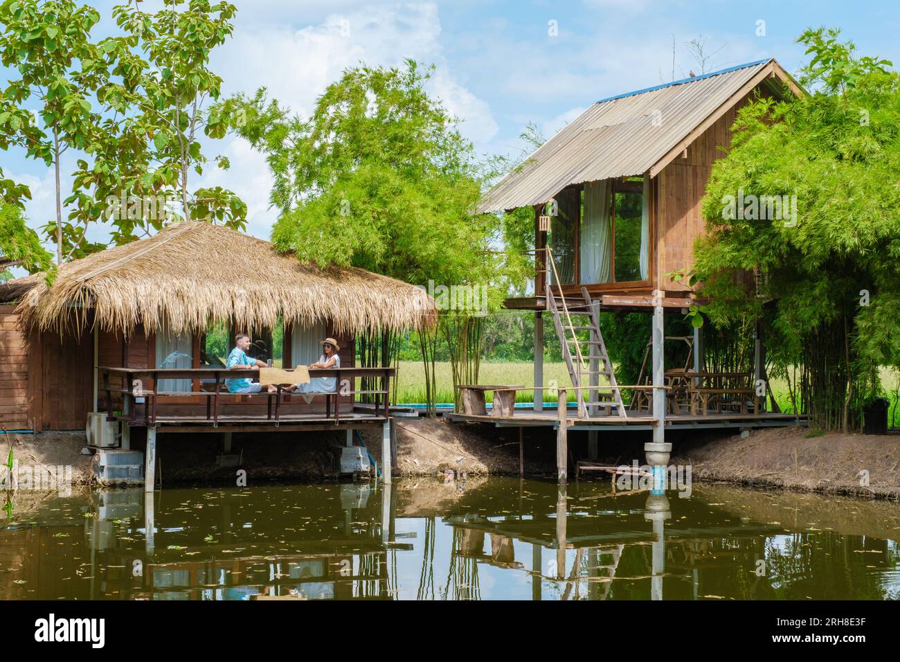 Bamboo hut homestay farm with Green rice paddy fields in Central ...