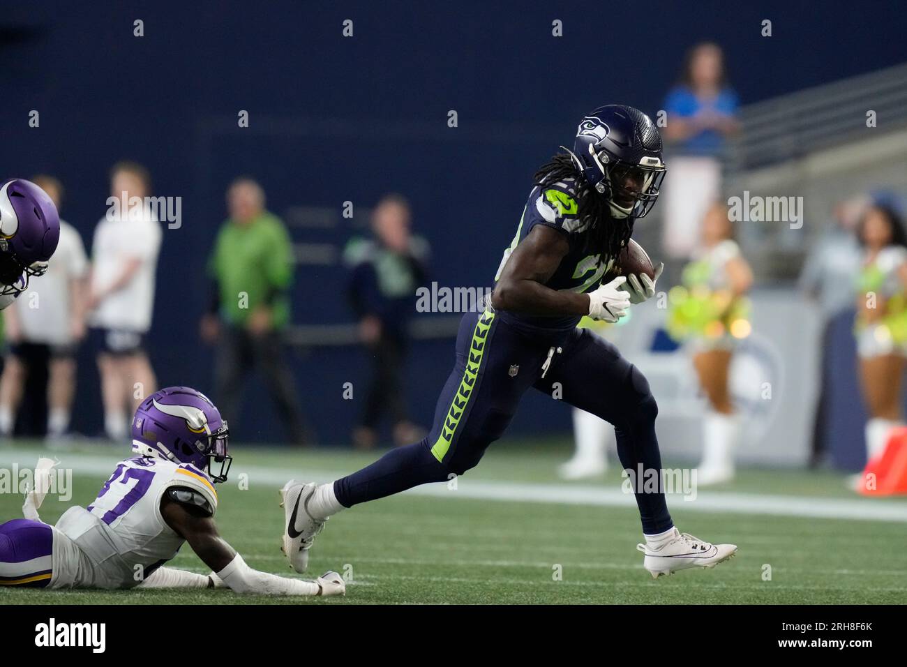 Seattle Seahawks running back SaRodorick Thompson Jr. runs against the  Dallas Cowboys during the second half of a preseason NFL football game  Saturday, Aug. 19, 2023, in Seattle. (AP Photo/Lindsey Wasson Stock