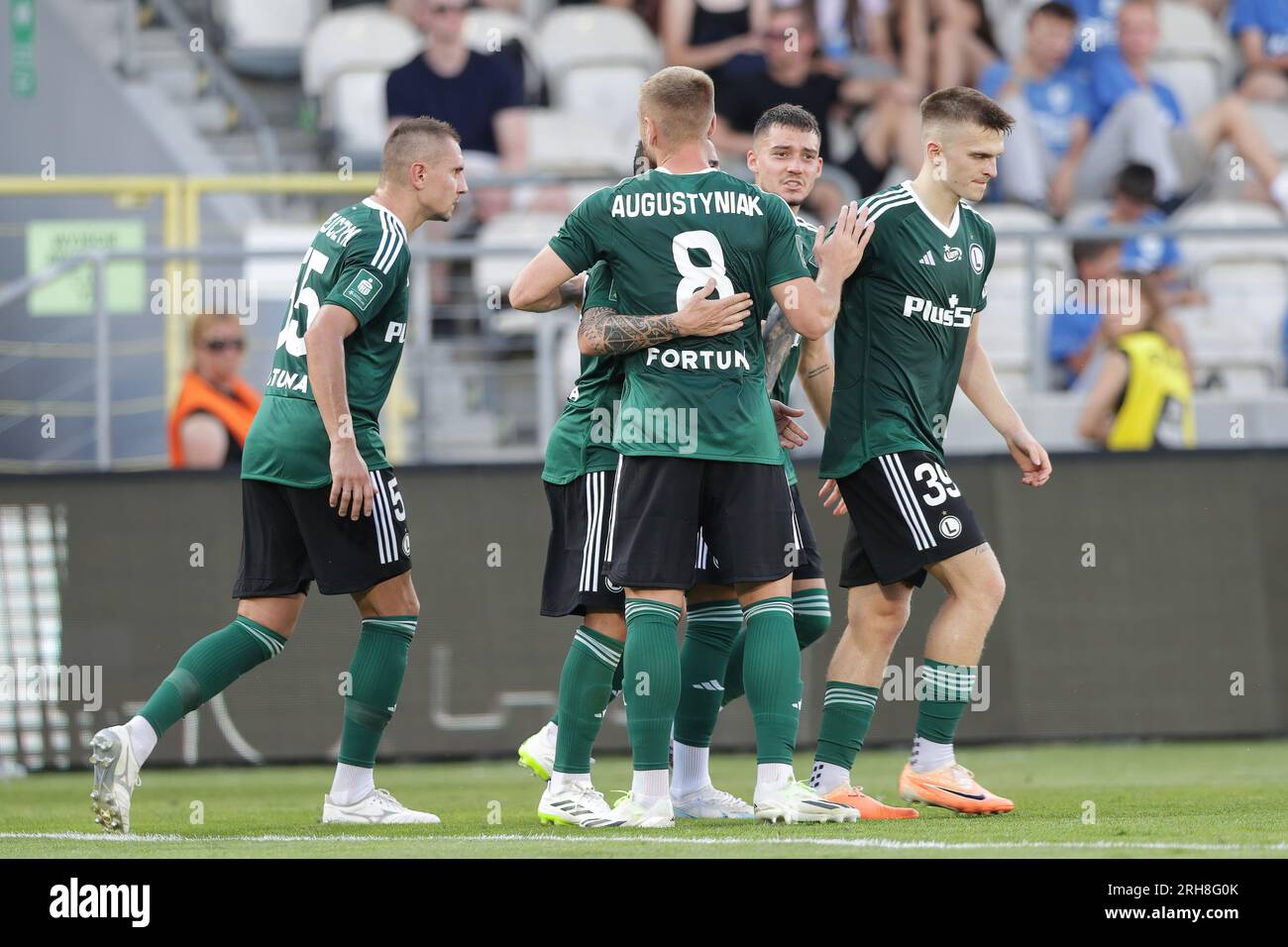 Krakow, Poland. 13th Aug, 2023. Legia Warszawa Players celebrate after